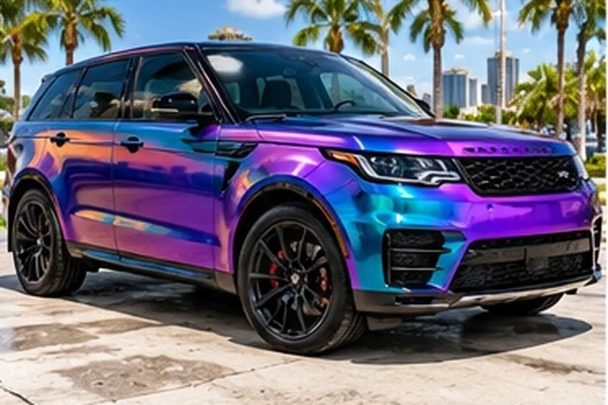 Color-shift purple and teal wrapped Range Rover with Tampa skyline